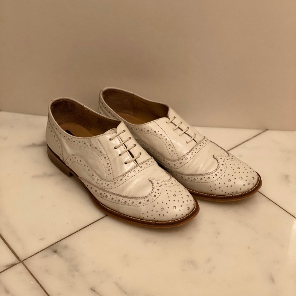 Women’s white leather brogue loafers with laces